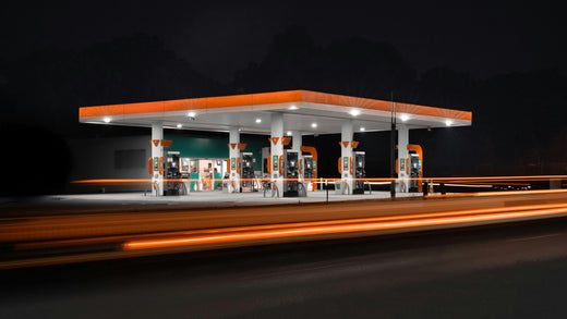 A gas station at night with motion blur