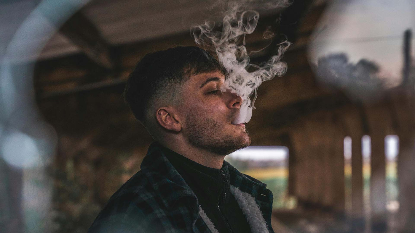 photo of man vaping