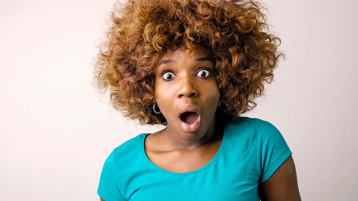 shocked woman with a blue t-shirt